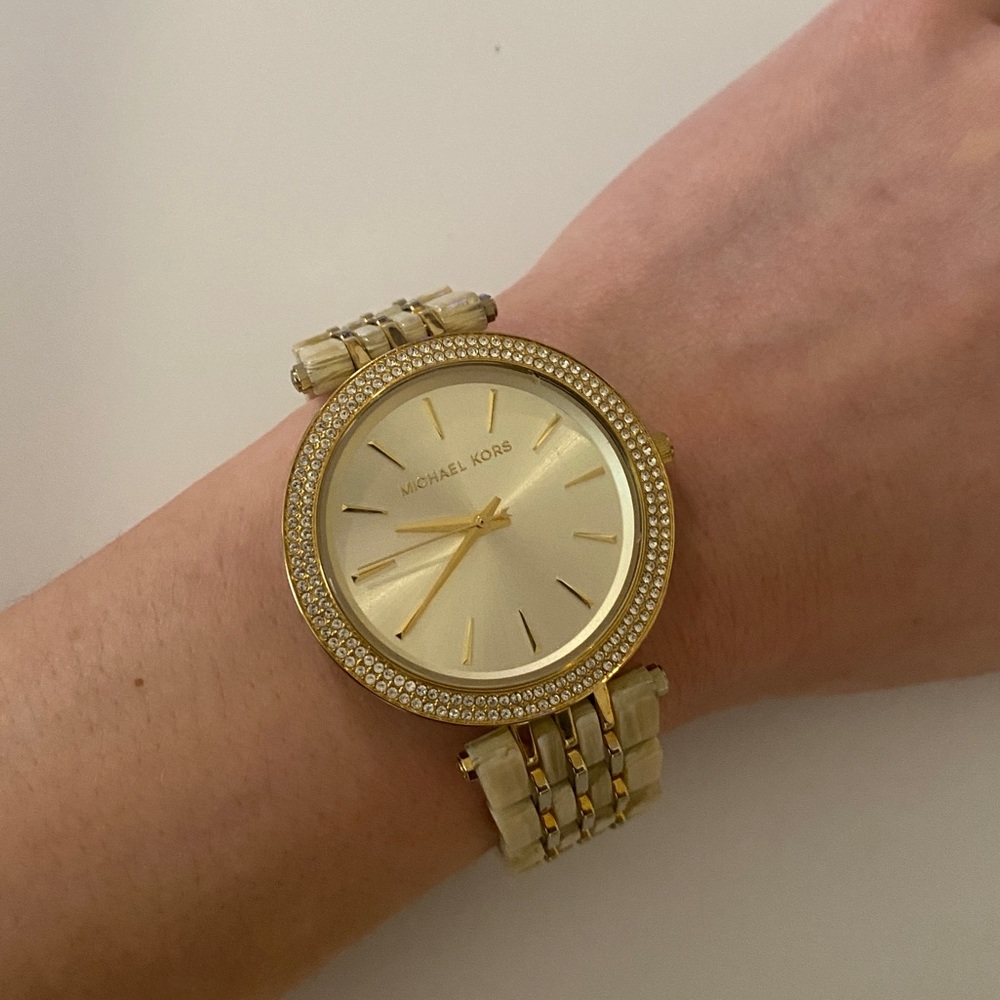 Michael Kors white and gold women’s wrist watch